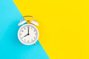 analog clock with yellow background